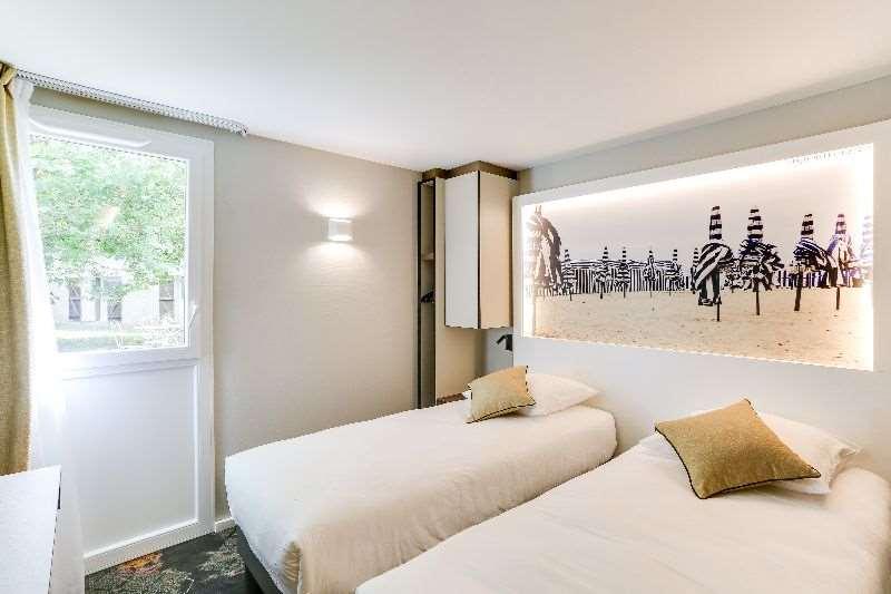 Brit Hotel Caen Nord - Memorial Room photo